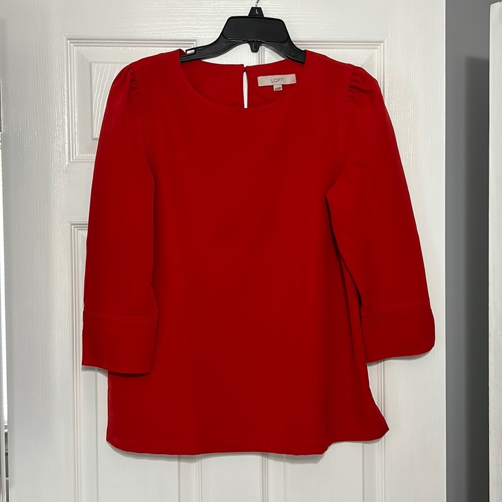 Red three-quarter sleeve eyelet blouse
